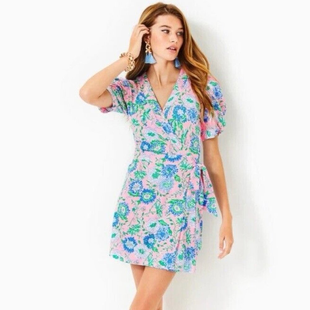 Lilly Pulitzer's Sailynn romper features shirred puff sleeves and a wrap-skort c